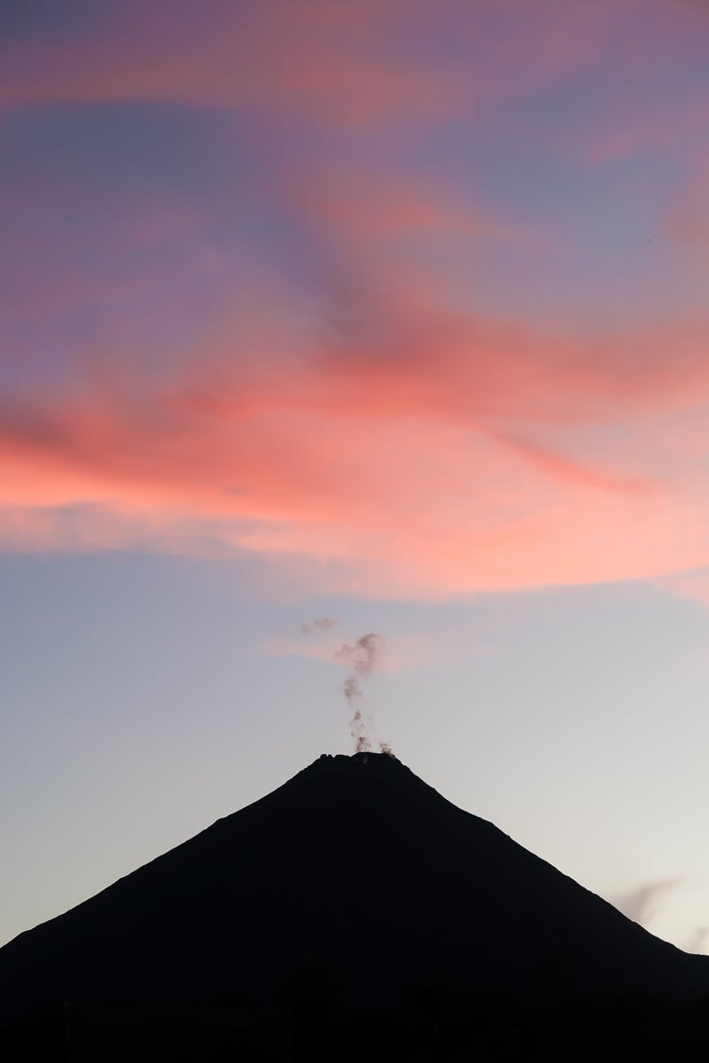 Gorgeous silhouette of the Arenal Volcano at sunset