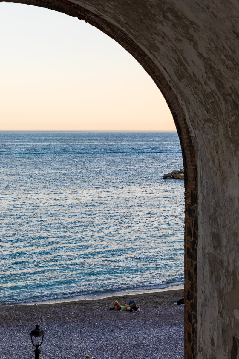 Sunset by the beach in Atrani. Enjoying the sunsets here is one of the best free things to do in Amalfi Coast.