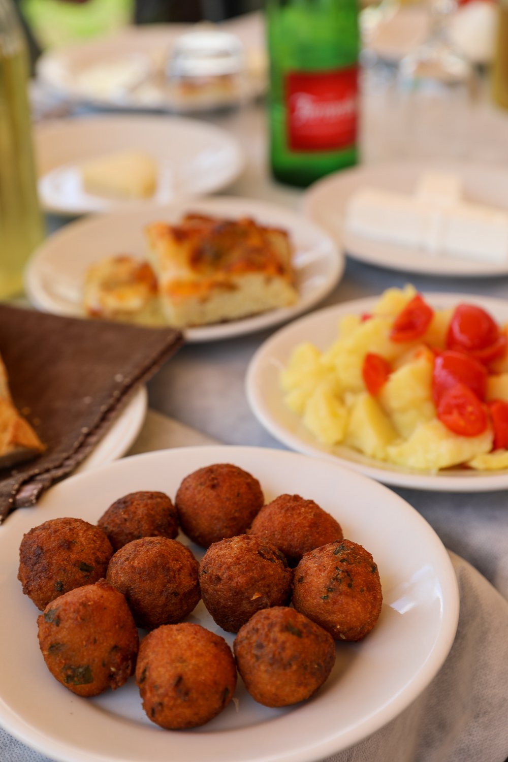 Several Pugliese delicacies served for lunch. This guide to Alberobello includes a bike tour to the Itria Valley - a must-try experience!