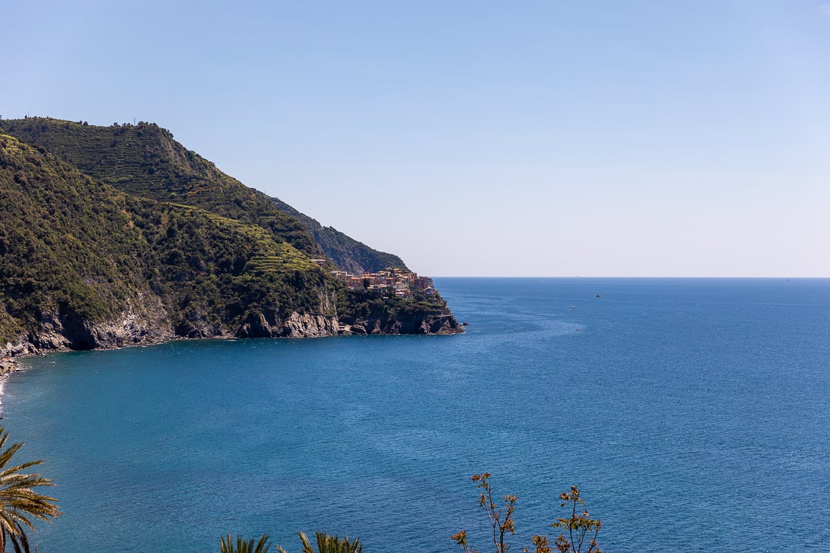A view of rugged coastline and dark blue seawater