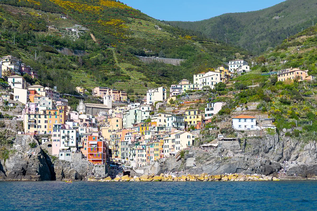 View of Riomaggiore town from the ferry in Cinque Terre