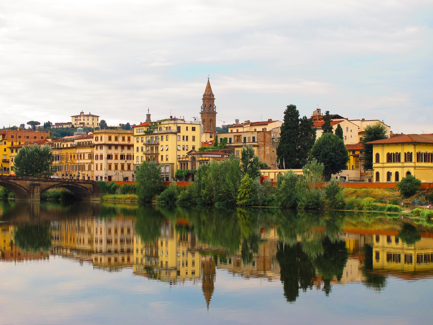 View of the Arno River and medieval buildings around it