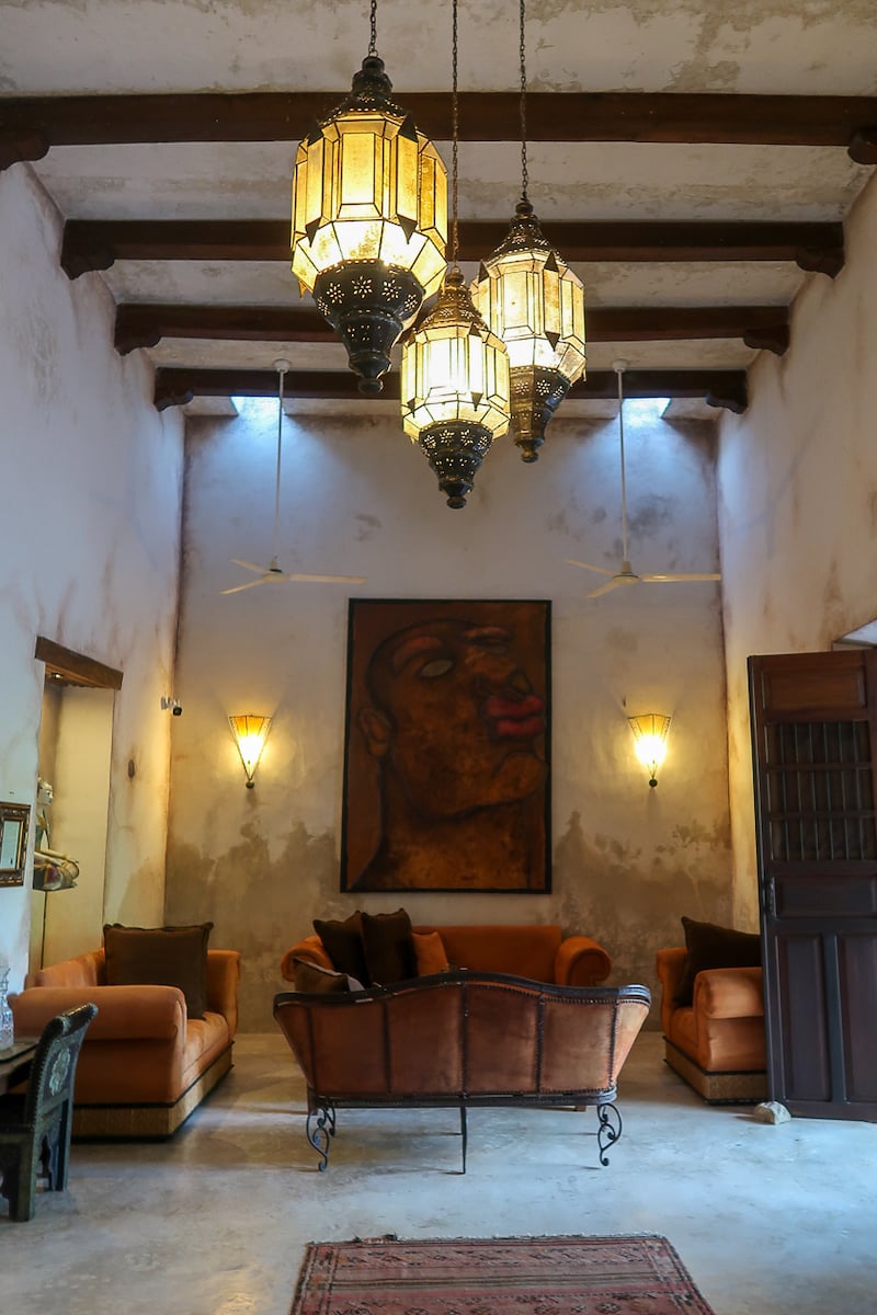 Living area with comfortable couches at Hacienda Sacnicte