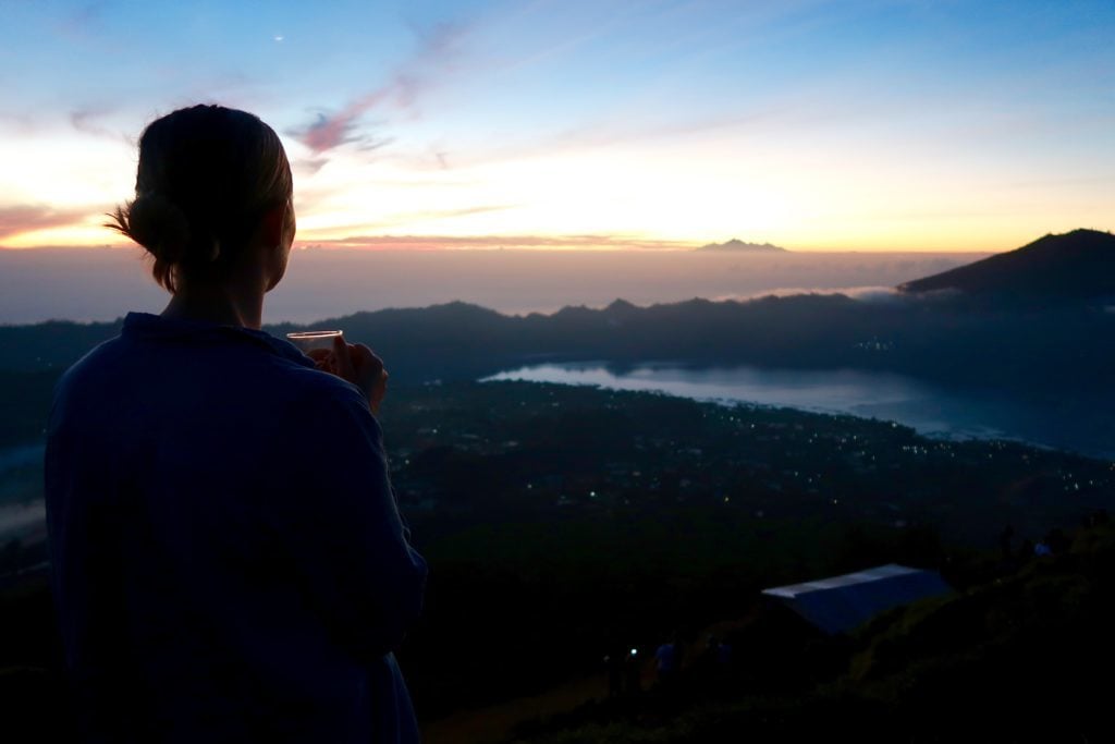 Looking for some Bali travel inspiration? Or maybe something to fuel your wanderlust? When you travel to Bali, there are a few things you must do! One of them, is hiking up Mount Batur early in the morning, to watch the sun rise from the top. In this post, we detail what it's like to climb one of Bali's volcanoes, to see a spectacular sunrise from the peak. We also list some very important tips, to help you have the best experience possible! If you're thinking of hiking Bali's Mount Batur at sunrise, then this post is for you!