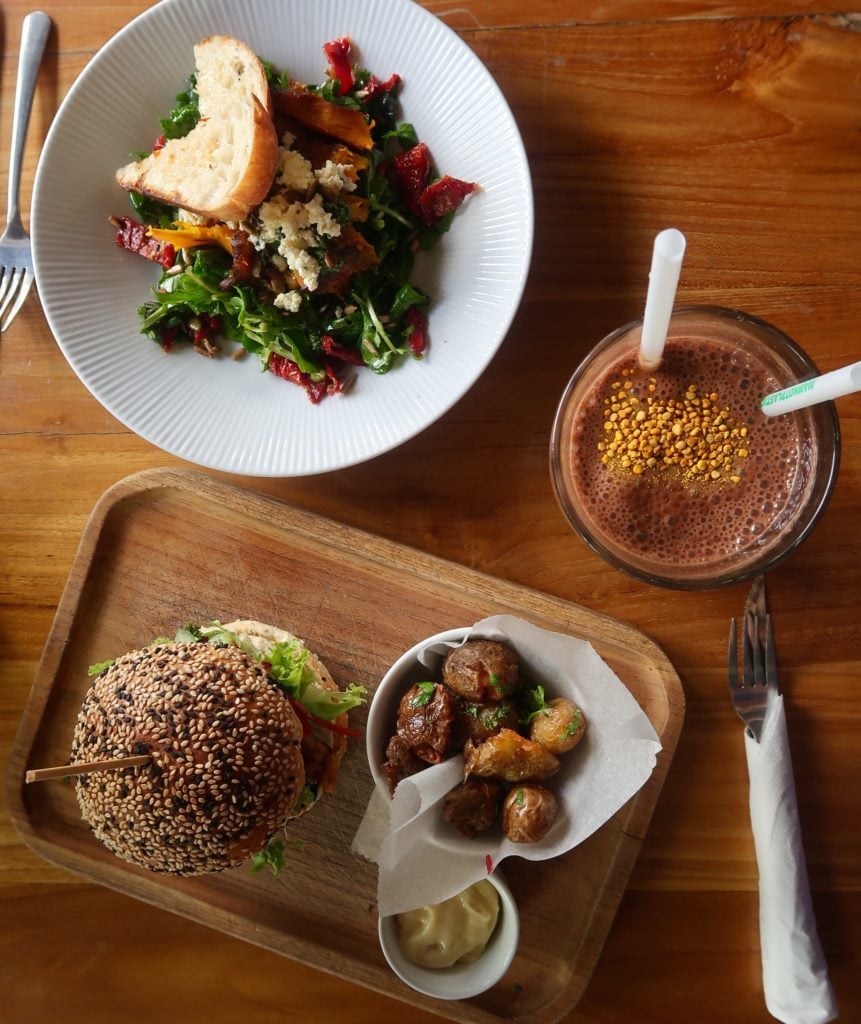 Delicious burger and a plate of salad at Watercress