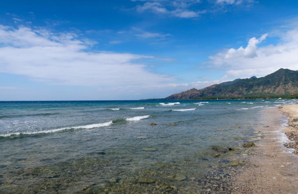 Shoreline with mountain in the background