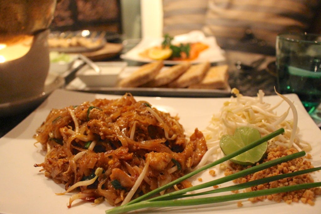 A local Thai dish with mung bean sprouts served on a white elegant ceramic plate