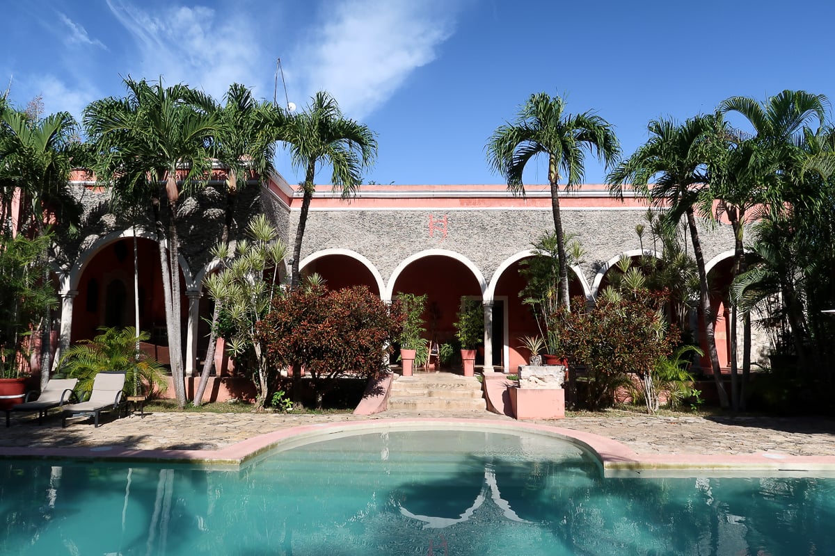 Pool area at a beautiful hacienda in Izamal. Staying in romantic haciendas is one of the things to do in Izamal.