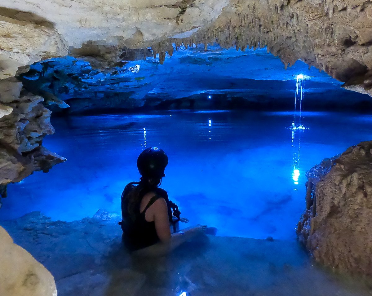 Maddy in a magnificent underground river at Kantunchi Eco Park