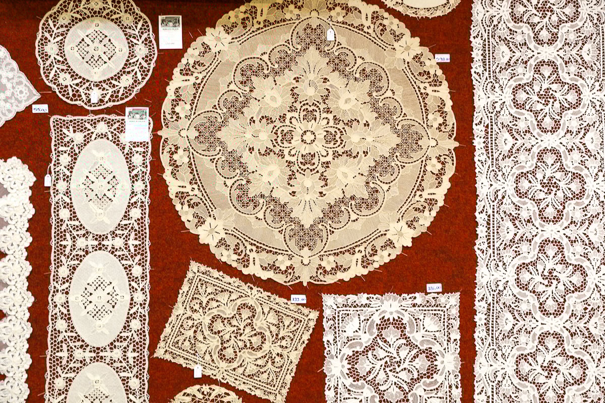 Intricate lace designs on display in Burano