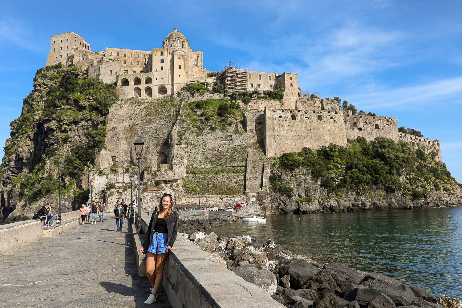 Maddy at the Aragonese Castle. Visiting this timeless marvel is one of the most recommended things to do in this ultimate guide to Ischia, Italy.