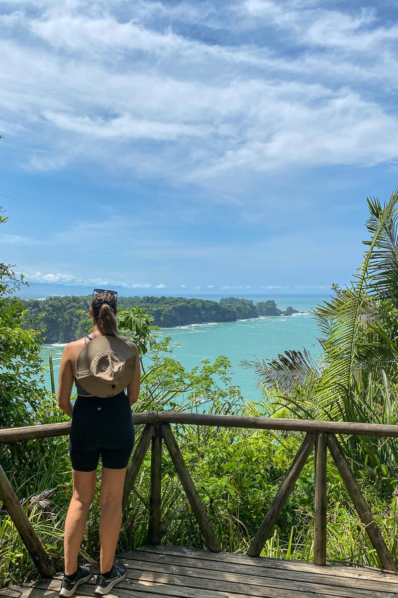 Maddy, blogger, enjoying the scenic view from a viewpoint in Manuel Antonio in Costa Rica
