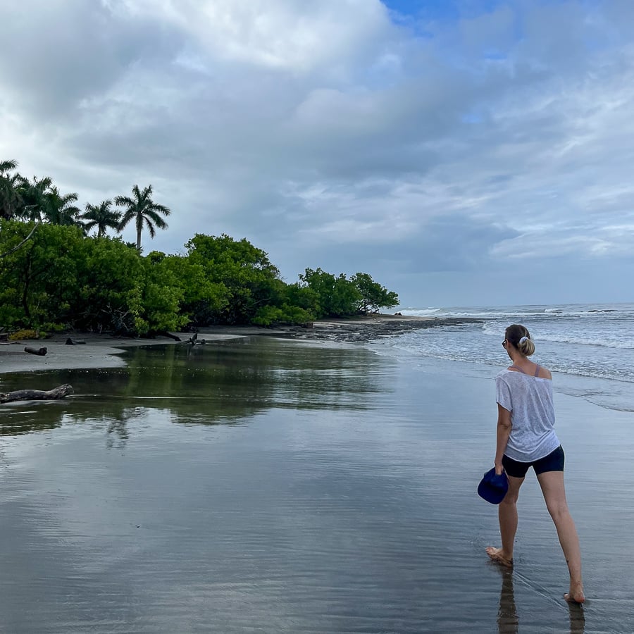 Maddy walking along Playa Negra in Costa Rica