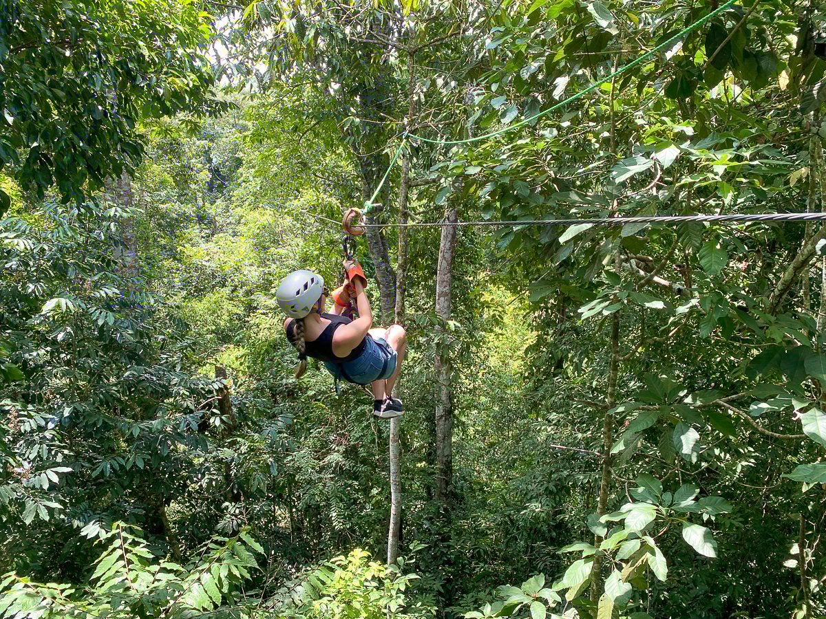Maddy ziplining through the jungle canopy of Manuel Antonio
