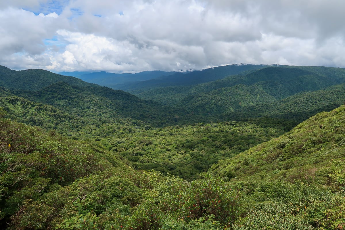 Lush mountains and cloudy skies at Monteverde Cloud Forest Reserve. Visiting this place is one of the things to do in Monteverde, Costa Rica.