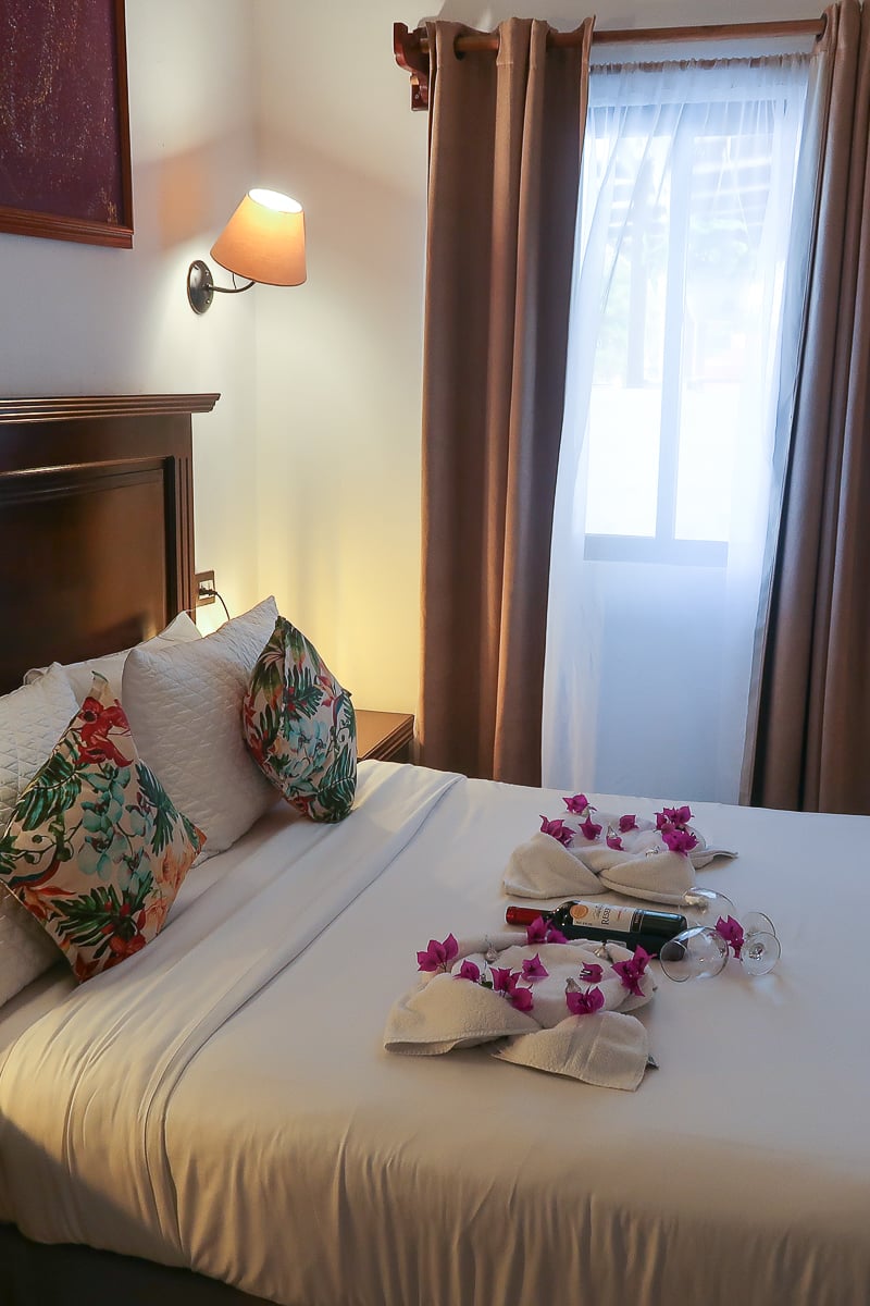 Beautiful bedroom by the window. Wondering where to stay in Monteverde? Camino Verde B&B is one of my recommendations.