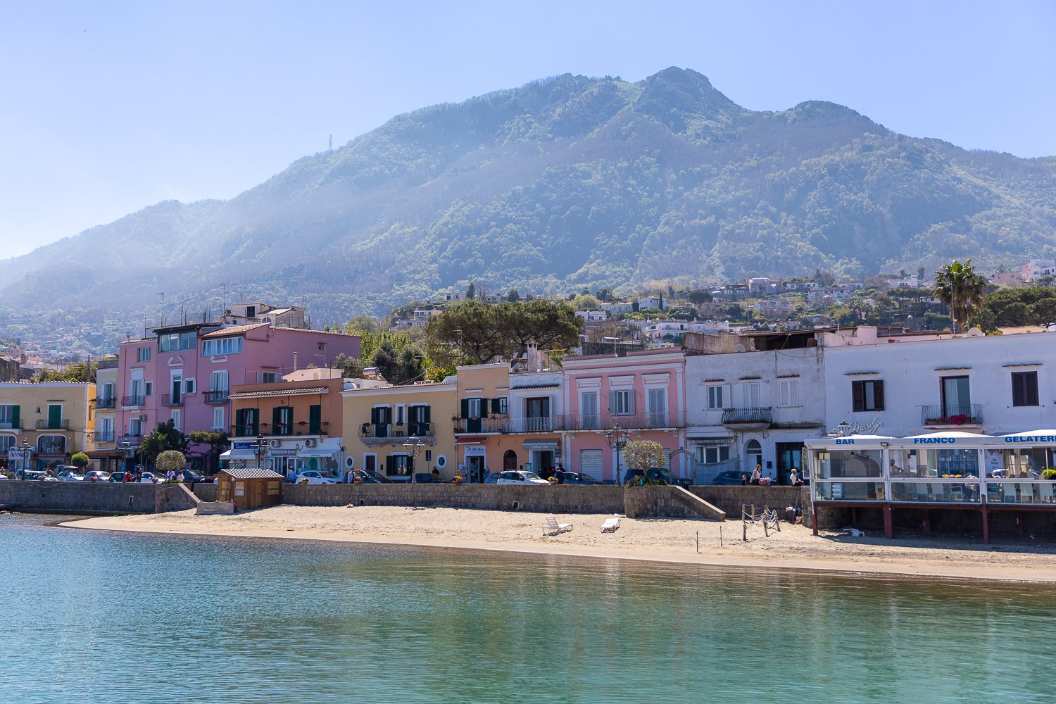 Colorful buildings by the beach in Ischia, Italy