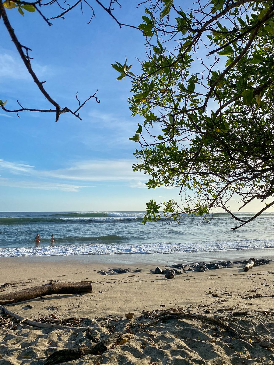 Wavy beach on a sunny day at Playa Avellanas, Costa Rica