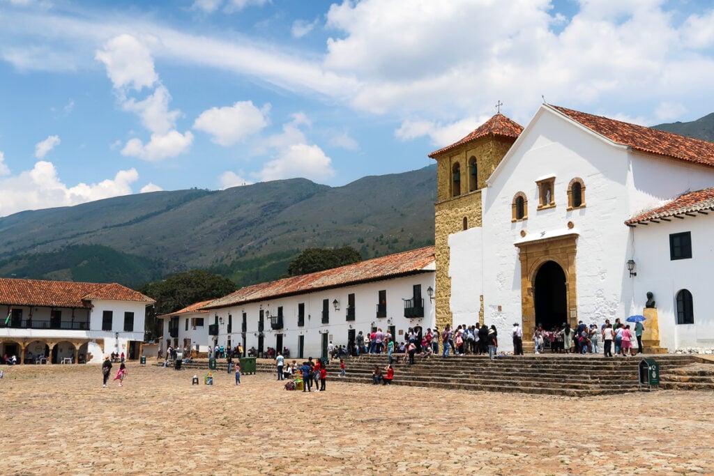 People roaming around the Plaza Mayor in Villa de Leyva