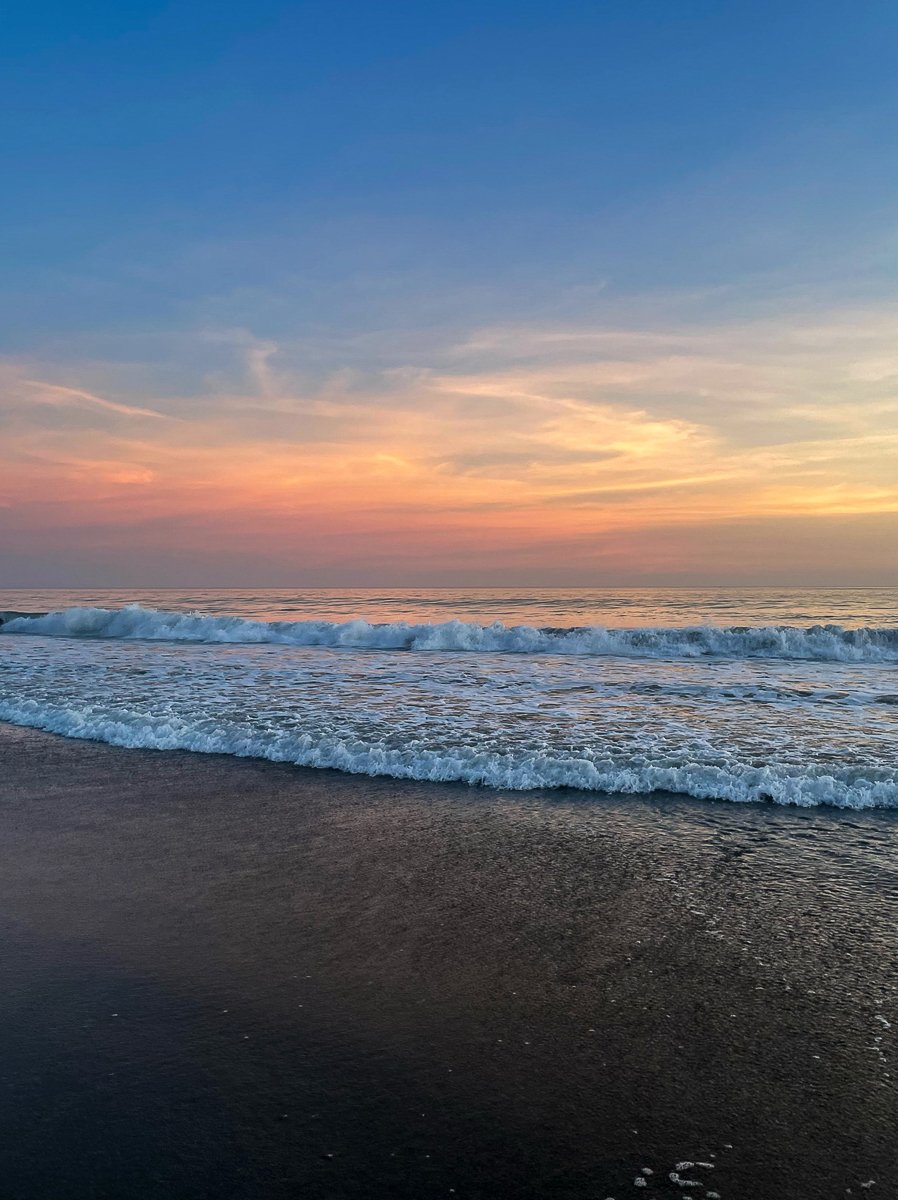 Waves of the beach during sunset