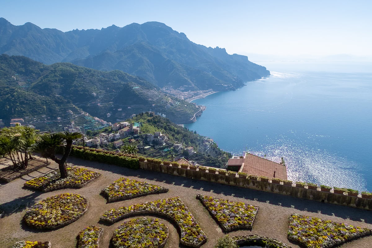 Beautiful gardens of Villa Rufolo with enchanting views of the mountains and the sea on a sunny day