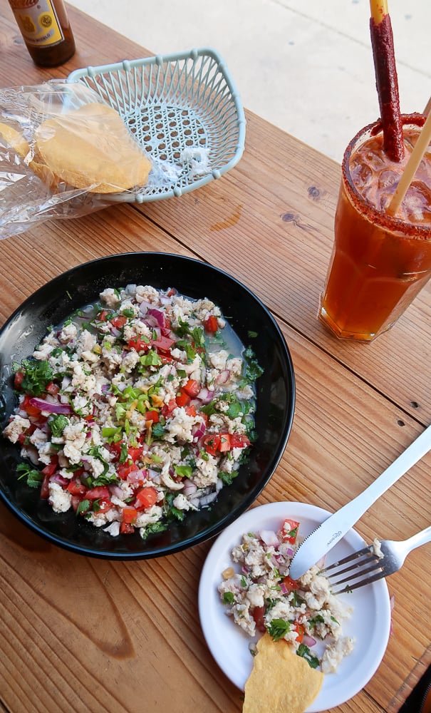 Delicious serving of ceviche and michelada at Restaurante "La Brisa del Mar"