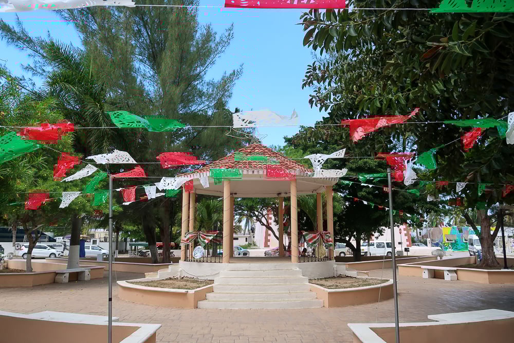 Gazebo and colorful flags at Puerto de Sisal