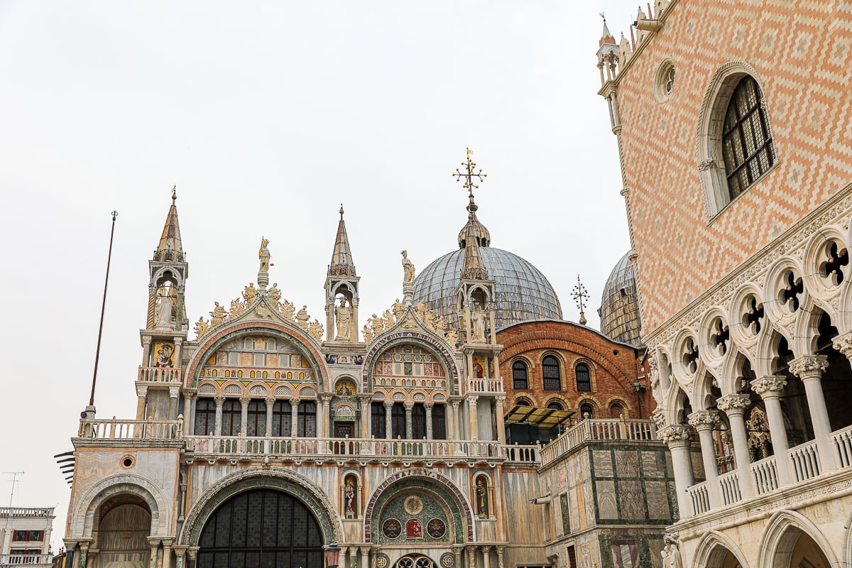 The ornate facades of Doge's Palace and St. Mark's Basilica