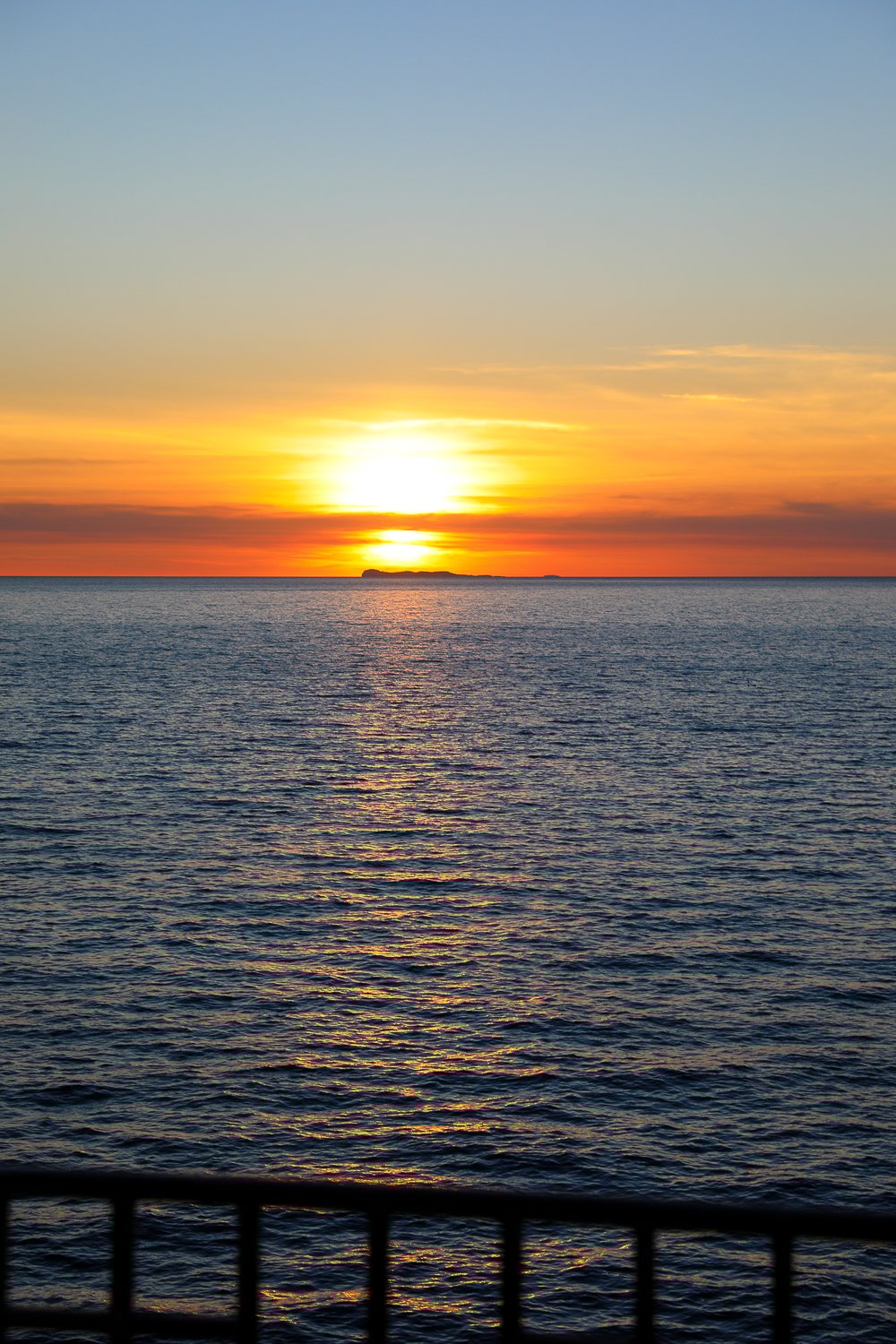 Sunset by the beach in Forio. Watching the sunset is one of the best things to do in Ischia, Italy.