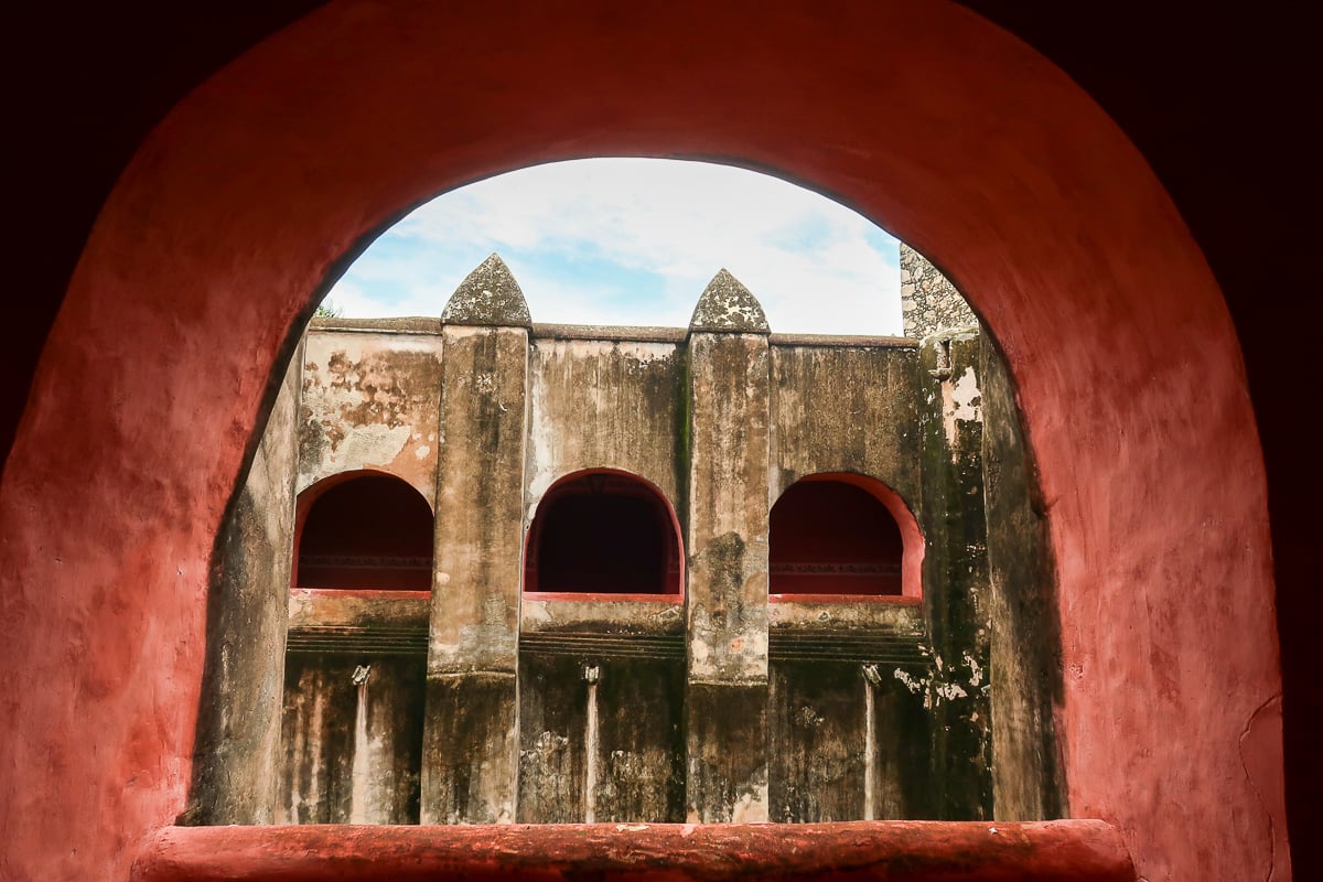 Beautiful pink corridors and arches at the Convento de San Bernardino de Siena