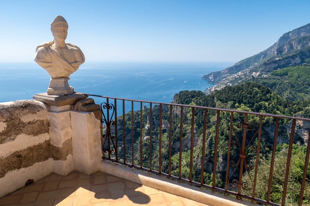 Marble bust on the corner of Terrazzo dell’Infinito overlooking the ocean and Amalfi Coast villages