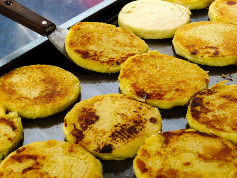 Colombian cheese arepas. Trying Colombian food is one of the awesome things to do in Bogota (Colombia).
