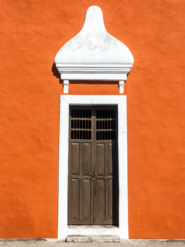 A beautiful facade of a red building in Mexico