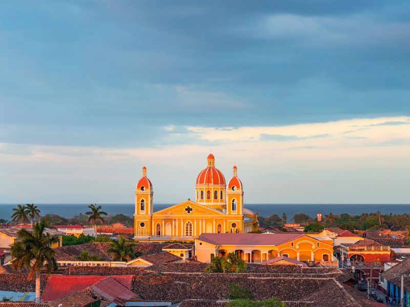 Colorful buildings and a stormy sky in in Nicaragua