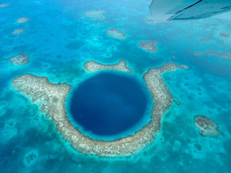 Flying over the Blue Hole - one of the best things to do in Caye Caulker