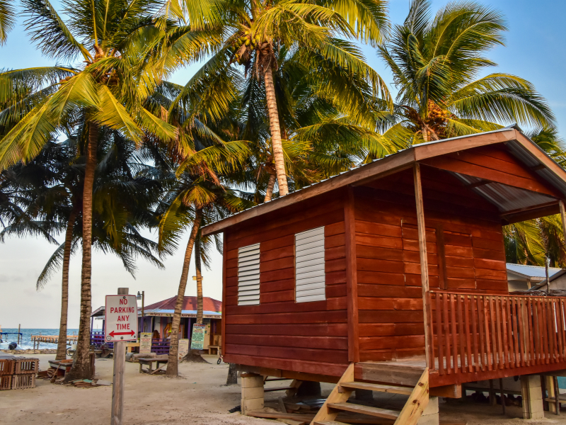A little wooden bungalow on the sandy island of Caye Caulker