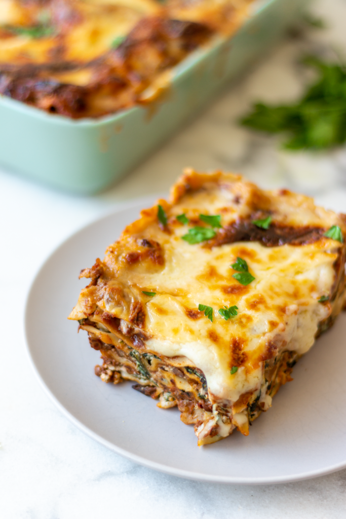 This is the world's best recipe for vegetable lasagne with bolognese sauce and béchamel, garnished with truffle oil and fresh parsley.