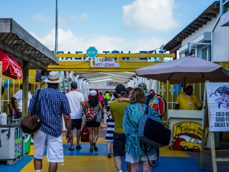 Crowd of people walking along a ship terminal in Belize