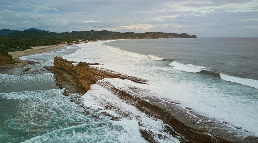 Rock formations and waves crashing